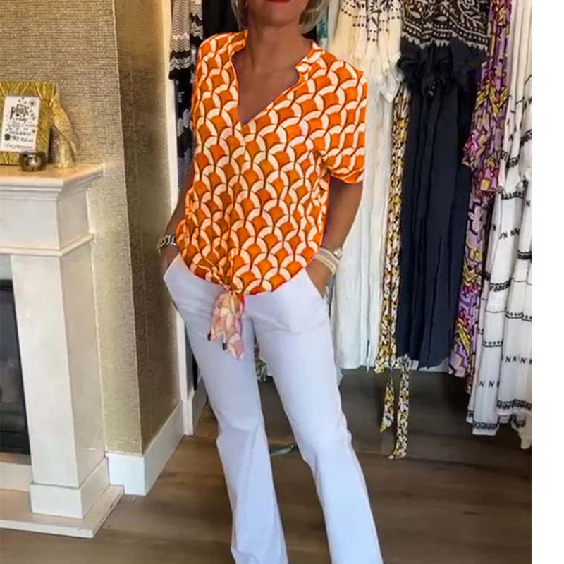 đLezser, rövid ujjĂș V-nyakĂș felsĆ