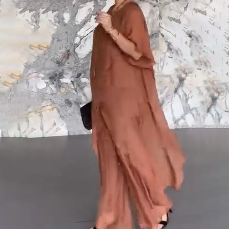 🛍️✨ Női szett, amely egy szabálytalan blúzból és egy könnyű nadrágból áll